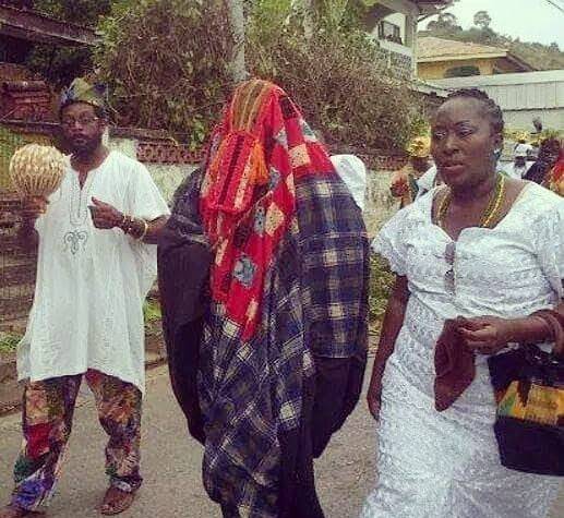 Procession of followers of the Egungun aAfrican festival